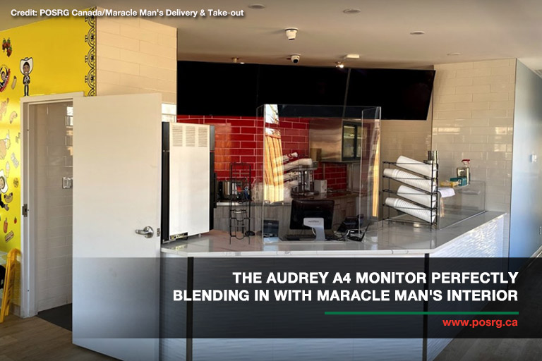 The AUDREY A4 monitor perfectly blending in with Maracle Man's interior